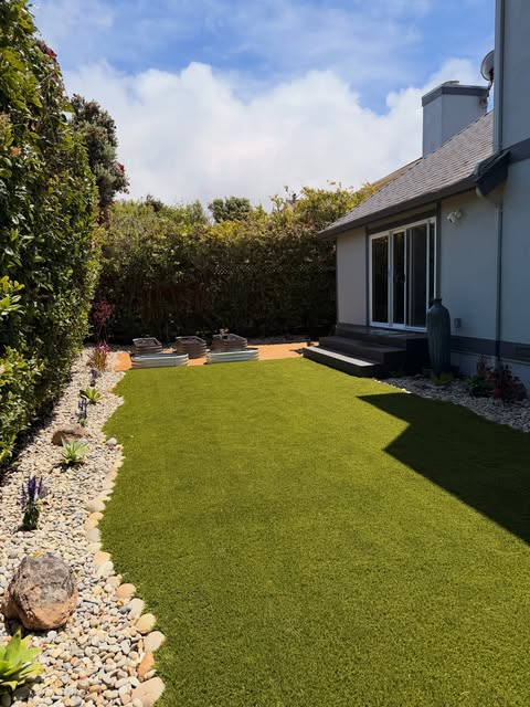 Completed CHR landscaping project with a green garden